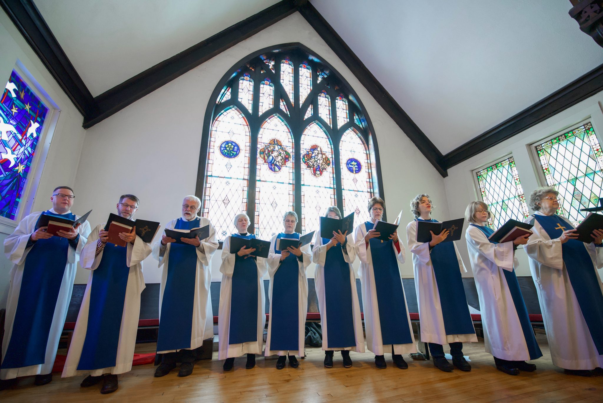 adult choir with blue haze